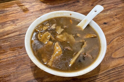 A bowl of delicious chinese hot pepper soup